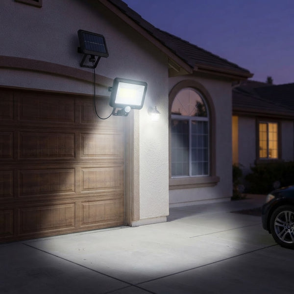 SL-F100 Separate Solar Wall Lamp providing bright illumination outside a house at dusk.