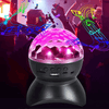 Wireless RGB Party Speaker with vibrant disco lights and music notes, perfect for lively events.