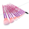 10pcs Clear Crystal Quicksand Makeup Brush Set featuring stylish pink handles and soft bristles for perfect makeup application.