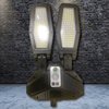 Solar Motion Wall Light - Energy Efficient Outdoor Security with dual LED panels for enhanced visibility at night.