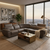 Modern L-Shape Sectional Lounge Suite in a bright living room with large windows and a cozy coffee table.