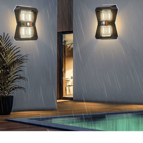 Solar Motion Wall Light installed on an exterior wall, providing illumination in a rainy outdoor setting.