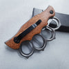 Tactical Trench Folding Knife with wooden handle and knuckle guard, ideal for outdoor and self-defense use.
