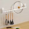 Multi-Functional Punch-Free Wall-Mounted Storage Rack with kitchen utensils and lid holder.