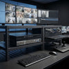 5MP 5-in-1 32-Channel Hybrid Digital Video Recorder setup with monitors and controls in a surveillance room.