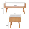 Eleonor Glass & Wood Coffee Table dimensions and design showing clear glass top and wooden base with storage.