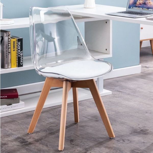 Scandinavian Transparent Elk Dining Chair with a minimalist design and clear seat on wooden legs.