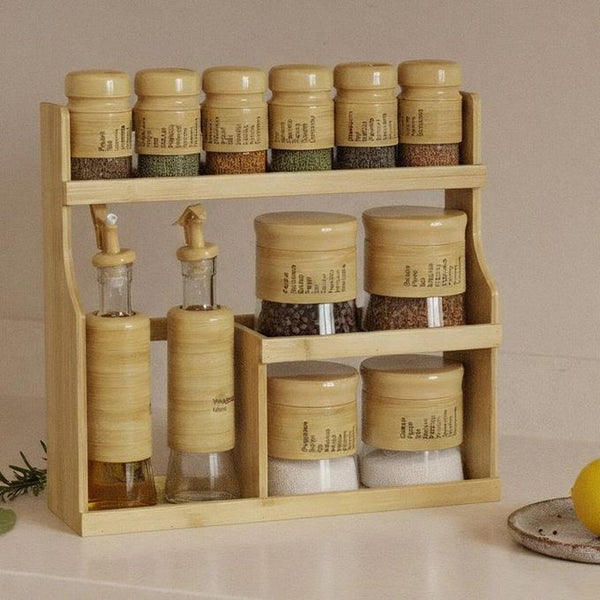 Glass Spice Jar Set with Bamboo Stand featuring spices, oils, and a stylish two-tier bamboo storage display.