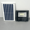 1200W LED Flood Light with Solar Panel next to solar panel for outdoor lighting and security.