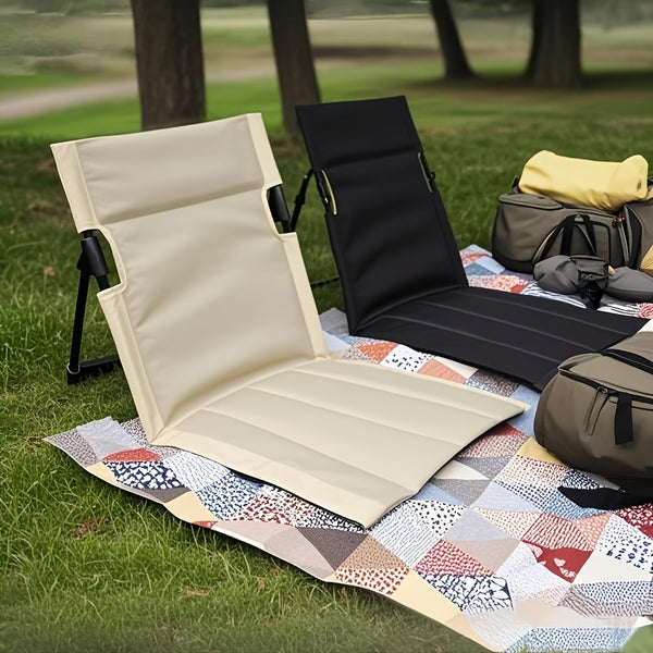 Ultra-Lightweight Folding Portable Camping Chair displayed in outdoor setting with a picnic blanket.