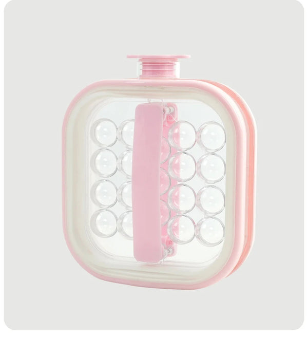 2-in-1 Ice Ball Maker Bottle with Lid in pink, compact design for freezing multiple ice balls.