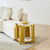 2 Tier Faux Marble Side Table next to a beige sofa, featuring modern design and practical shelving.