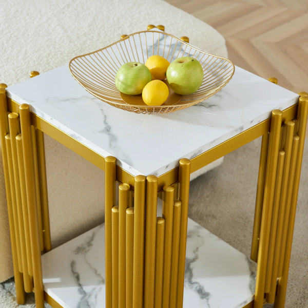 2 Tier Faux Marble Side Table with golden legs and a bowl of fruits on top.