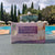 Abdominal Slimming Tea box pack with slimming benefits near a poolside, promoting natural weight management.