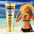 Collagen 60+ SPF Dry Touch Sunblock Cream 100ml in a beach setting with a woman wearing a sun hat.
