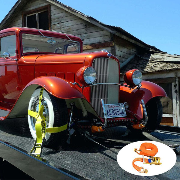 5m Ratchet Tie Down securing a vintage car on a trailer during transport.