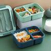 3-Compartment Microwave-Safe Bento Lunch Container with assorted meals and vegetables.