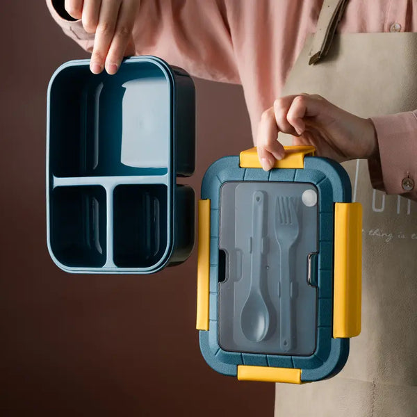 3-Compartment Microwave-Safe Bento Lunch Container with utensils, perfect for kids and office use.