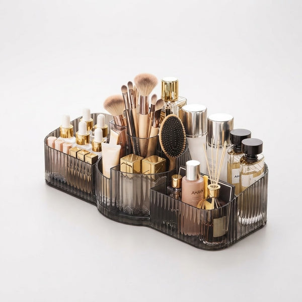 Multi-Compartment Cosmetic Desktop Storage Box filled with makeup brushes and skincare products in grey and gold design.