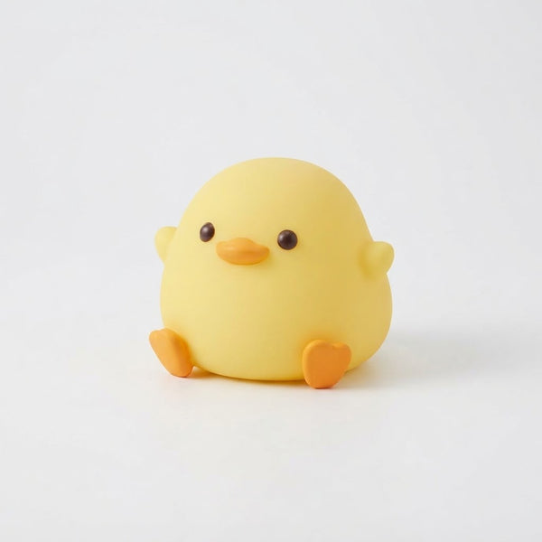 Squishy Silicone Duck Night Light in playful duck shape with a soft glow and touch controls for easy operation.