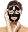 Woman applying Charcoal Blackhead Removal Mask on her face for effective skincare.