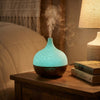 Ultrasonic Aroma Air Humidifier & Essential Oil Diffuser with ambient LED lighting and mist.