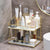 2-Tier Space-Saving Bathroom Rack displaying organized toiletries and cosmetics in a stylish bathroom setting.