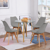 Round Glass 5 Piece Dining Set with Fabric Chairs featuring a round glass table and modern fabric chairs.