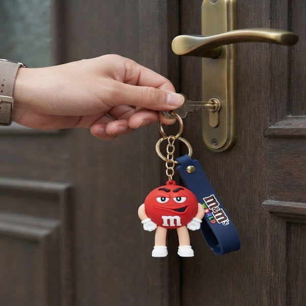 3D Candy Character Keychain featuring a playful red character with arms, attached to a door key.