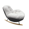 Velvet Rocking Lounge Chair featuring soft upholstery and a gentle rocking motion for ultimate relaxation.