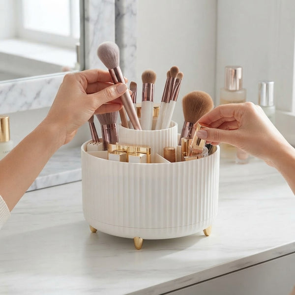 360-Degree Rotating Desktop Storage Bucket with makeup brushes and cosmetic products organized elegantly on a vanity.