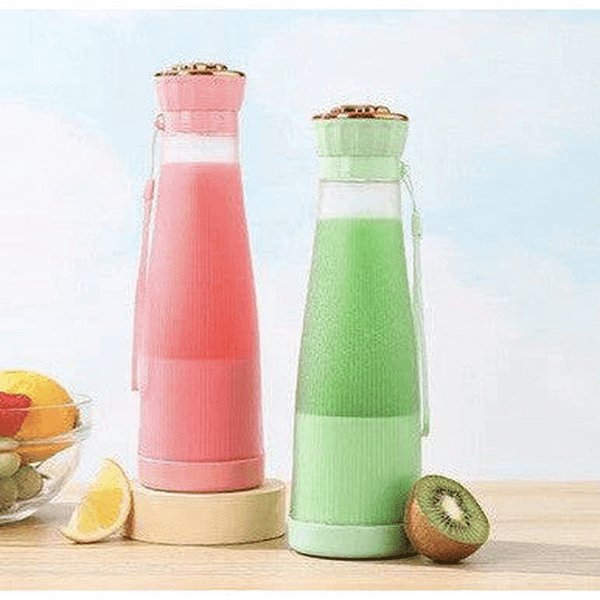 Smoothie Blender Cup in pink and green, perfect for blending smoothies on the go.