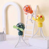 Portable Handheld Atmosphere Projector in colorful designs enhancing room ambiance with soothing lighting effects.