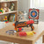 Shooting Soft Bullet Blaster Toy Foam Dart Gun Set with darts and target on a table, ideal for kids' play.