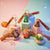 Hoppers PVC and Silicone 3D Animal Keychain assortment with vibrant designs on colorful background.