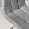 Close-up view of the Enzo Faux Leather C Frame Dining Chair showcasing its quilted upholstery.