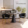 Braided Velvet Plush Fabric Dining Chair displayed with a modern round table in a stylish dining room setting.