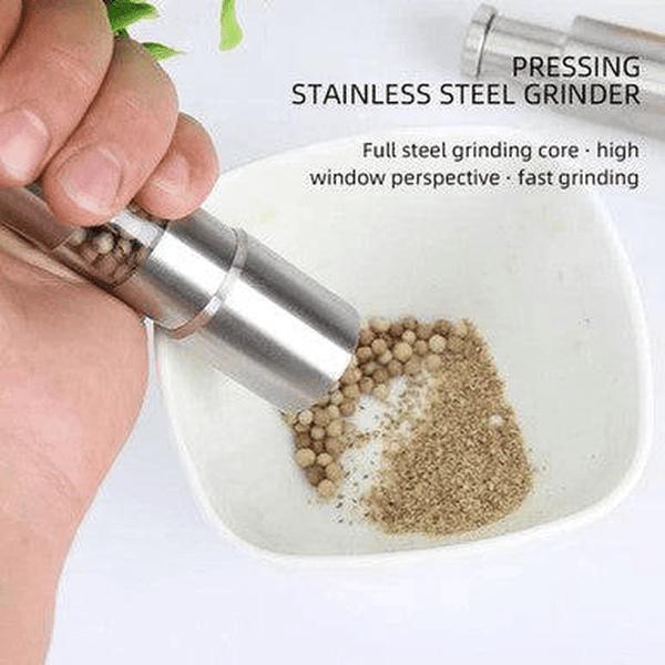 Chef Master Adjustable Salt & Pepper Grinder in use, featuring stainless steel design and adjustable grinding for precise seasoning.