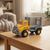 Friction-Powered Utility Cargo Truck Toy in a playroom setting, showcasing its bright yellow design and sturdy build.