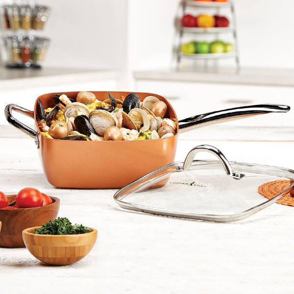 5Pcs Set Deep Dish Square Pan 9.5'' filled with seafood and vegetables on a kitchen countertop.