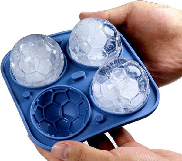 Sports Ice Ball Molds in hand, featuring soccer-shaped ice balls ready for drinks.