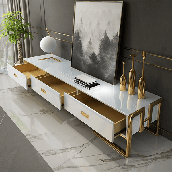 Urban Modern Media Console with a sleek design featuring drawers and decorative items on a marble floor.