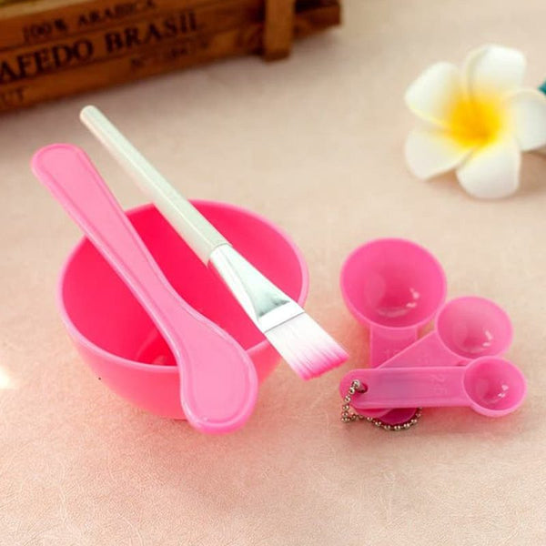 4 in 1 Mask Bowl and Brush Set with pink bowl, brush, and measuring spoons for skincare routine.