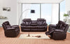 Lux Comfort Reclining Sofa in a modern living room setting with a stylish lamp and large windows.