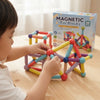 Child playing with 36-Piece Magnetic Bar Building Blocks Set, creating colorful structures.