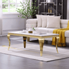 Sleek Modern Coffee Table with gold legs, stylishly placed in a contemporary living room setting with cream sofa and decorative plants.