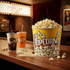 Extra Large Retro-Style Popcorn Bucket filled with popcorn on a movie theater snack bar.
