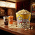Extra Large Retro-Style Popcorn Bucket filled with popcorn on a movie theater snack bar.