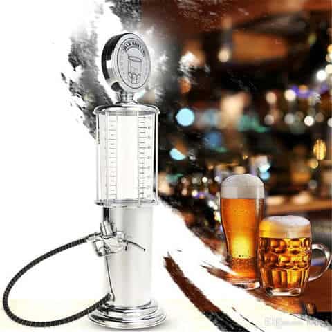 Bar Butler Liquor Pump showcasing a sleek design next to two glasses of beer in a bar setting.