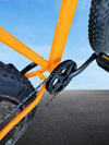 26'' Large Frame Black Fat Tire Bicycle close-up view of pedal and fat tires on a smooth surface.